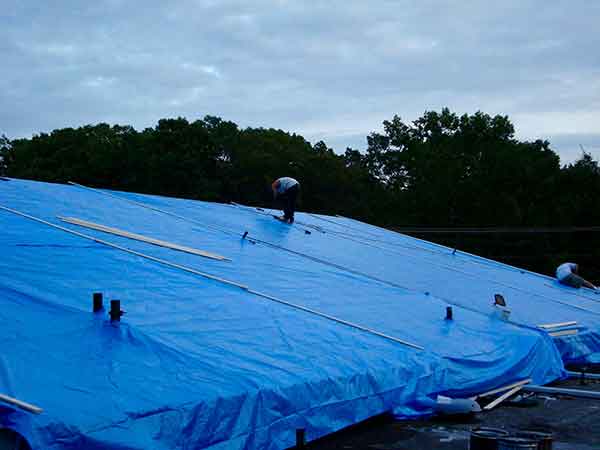 If your building needs commercial emergency roof service, call Anderson Contractors